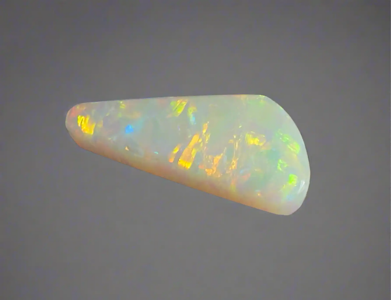 Iridescent white opal gemstone.