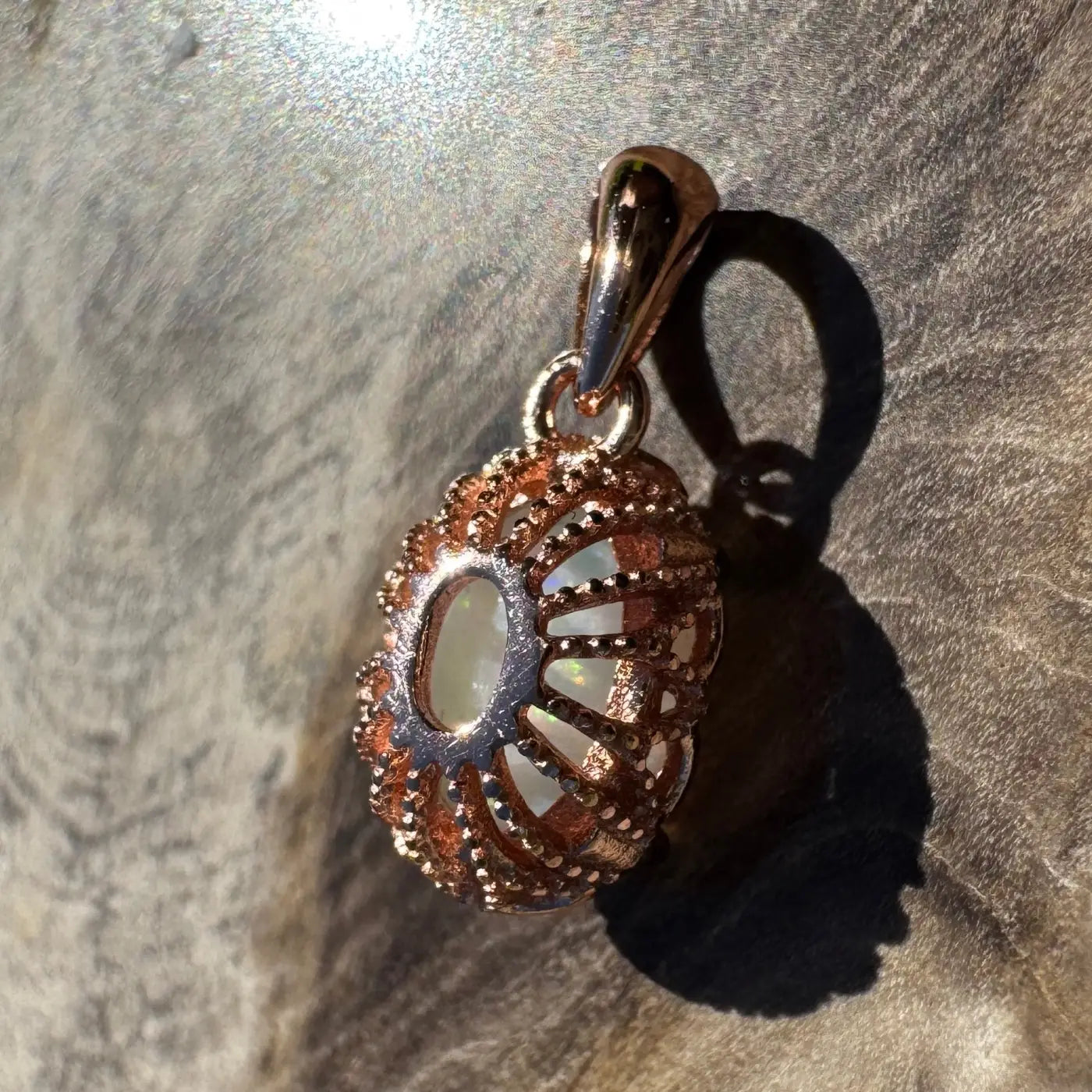 Rose gold opal pendant in Larapinta Flame handcrafted with Coober Pedy opal and sterling silver