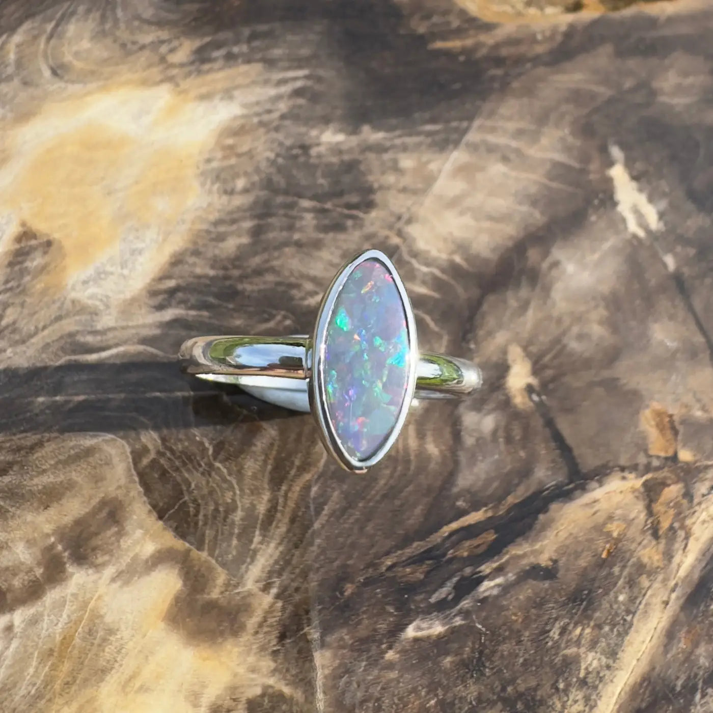 Silver ring featuring iridescent Lightning Ridge Opal in handcrafted 925 Sterling Silver design