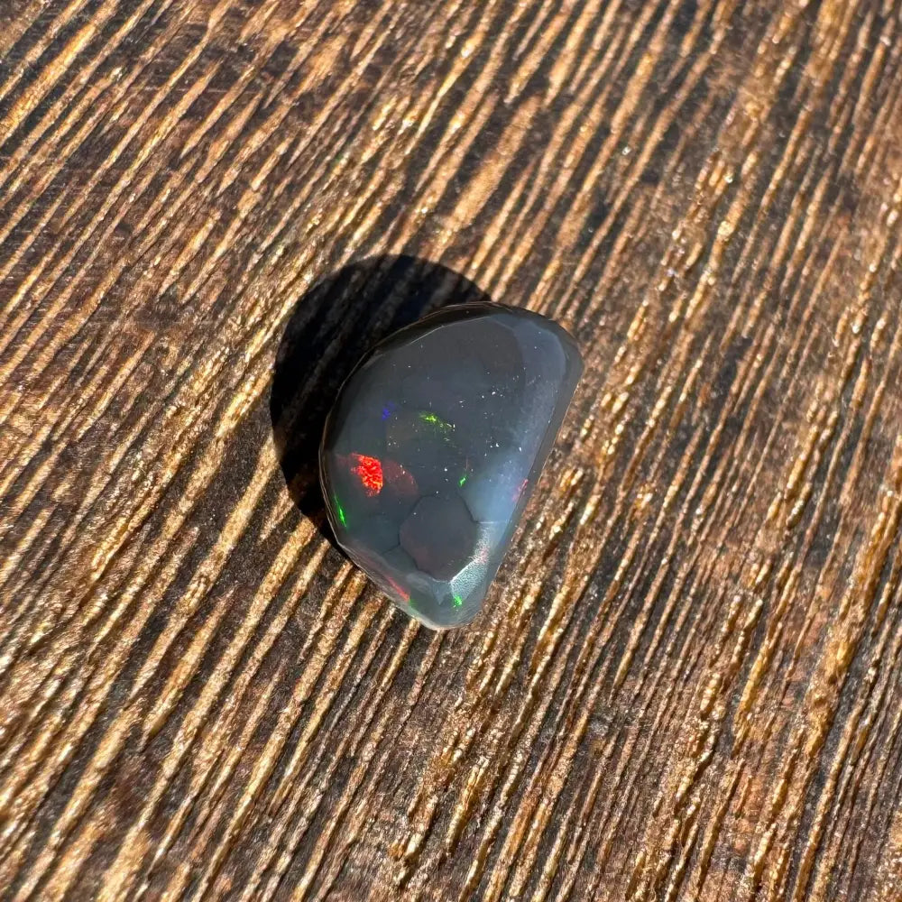 Polished Lightning Ridge Black Opal 1.4 carat with vibrant colorful flashes