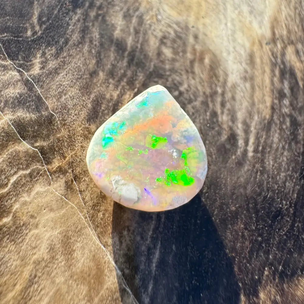 Iridescent Opal gemstone from Lightning Ridge exhibiting vibrant play-of-color