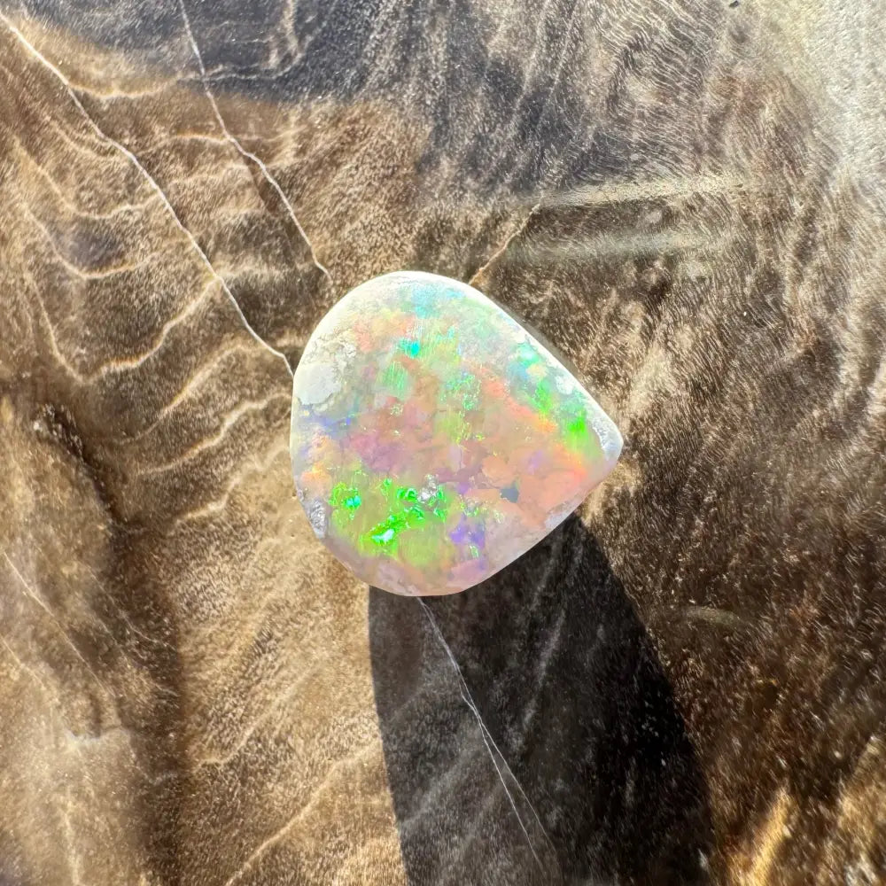 Iridescent Lightning Ridge Opal gemstone in a 1.6carat solid hand-cut jewelry setting