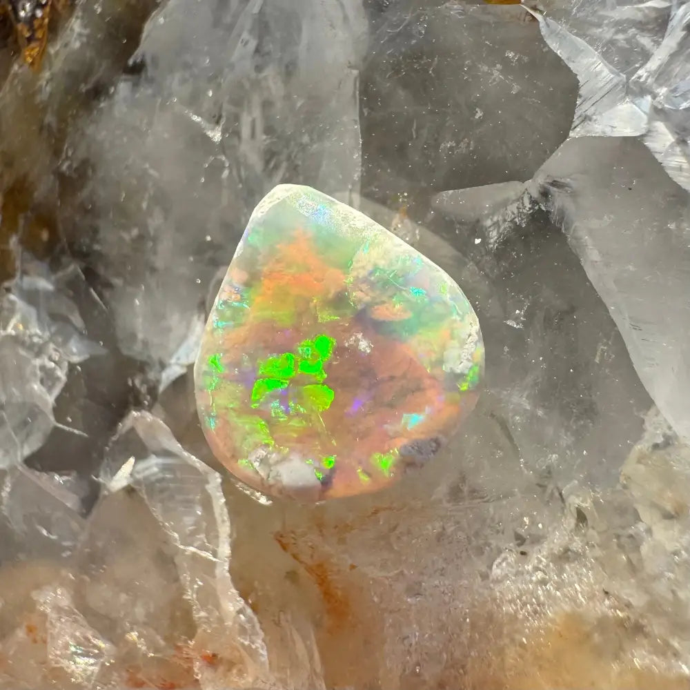 Iridescent Lightning Ridge Opal gemstone in a 1.6-carat solid hand-cut setting