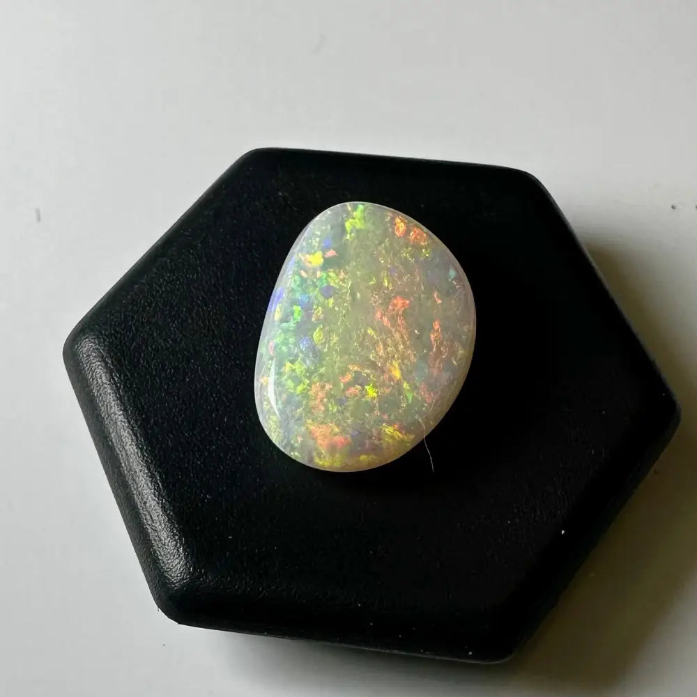 Iridescent Lightning Ridge Opal gemstone in a 2.4carat solid hand-cut jewelry piece