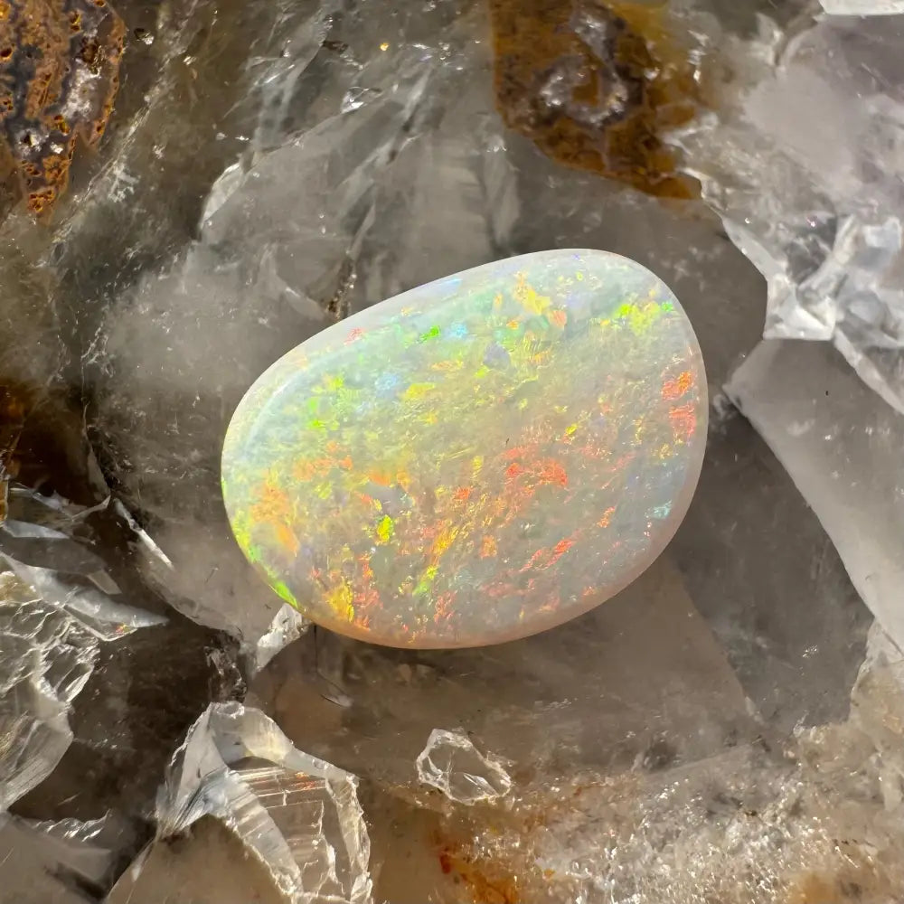 Polished Lightning Ridge Opal gemstone with vibrant color play, 2.4 carats solid hand-cut