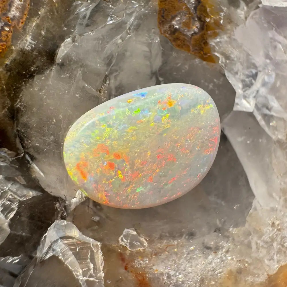 Polished Lightning Ridge Opal 2.4 carat solid hand-cut gemstone with vibrant color play