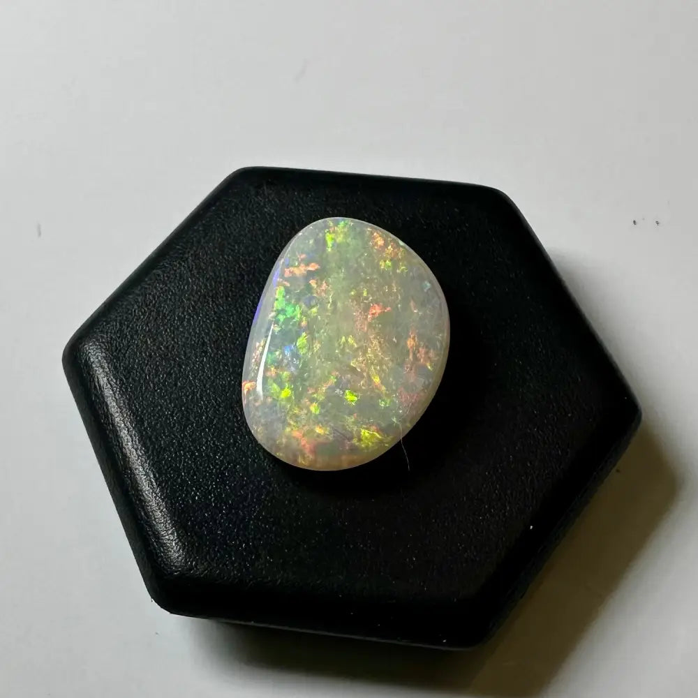 Iridescent Lightning Ridge Opal gemstone in a 2.4carat solid hand-cut setting