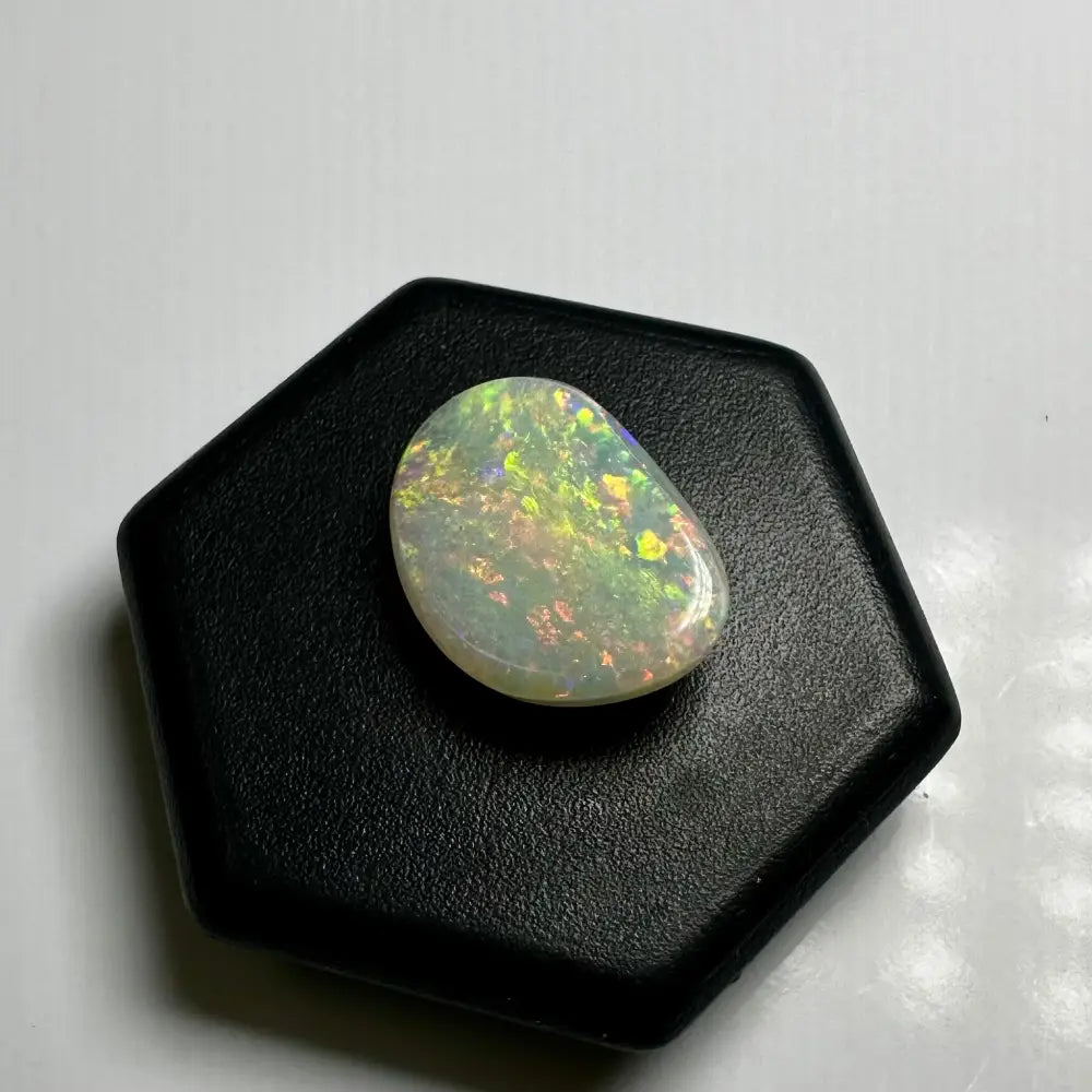 Iridescent opal gemstone from Lightning Ridge, 2.4 carat solid hand-cut specimen