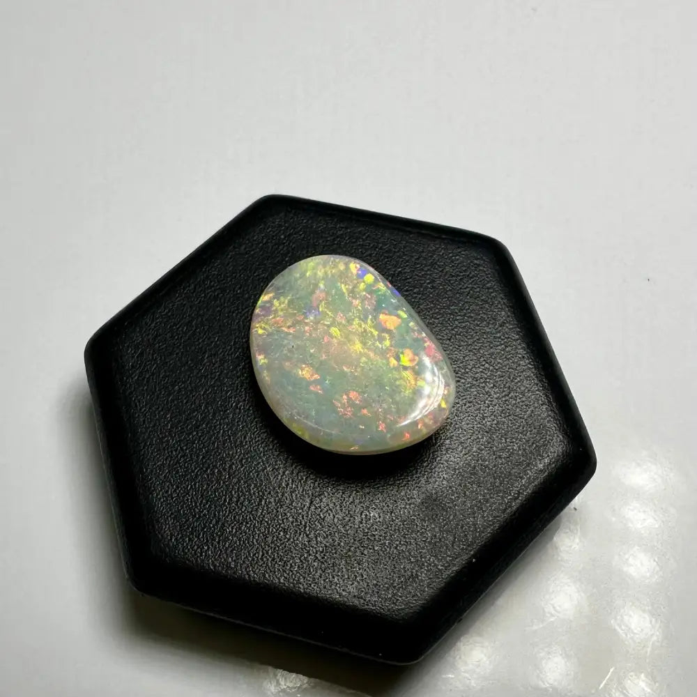 Iridescent opal gemstone in Lightning Ridge Opal 2.4 carat solid hand-cut jewelry