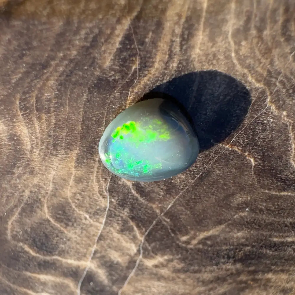 Iridescent opal cabochon from Lightning Ridge Semi Black Opal 0.4 carat solid hand-cut