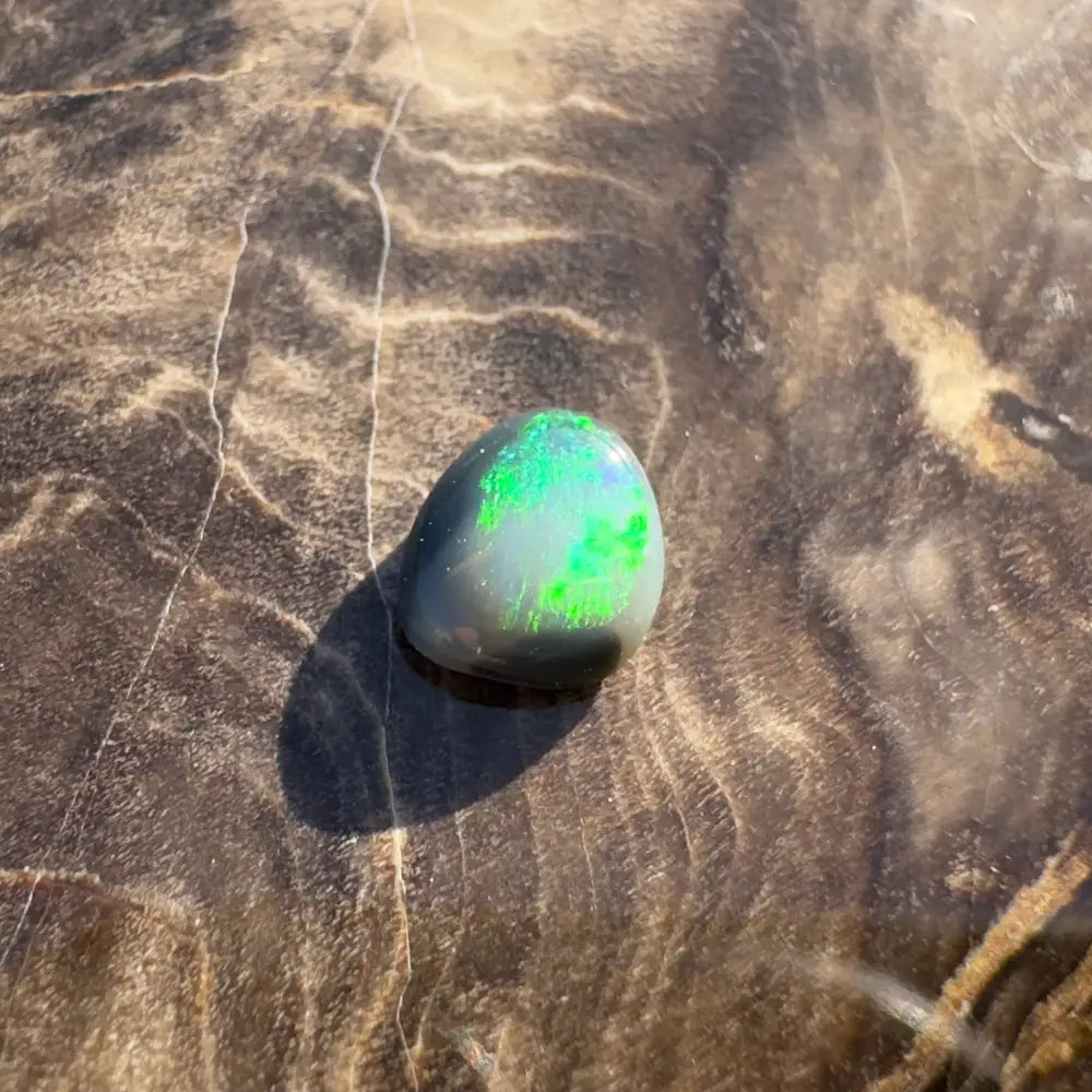 Iridescent green and blue opal from Lightning Ridge Semi Black Opal 0.4carat solid hand-cut