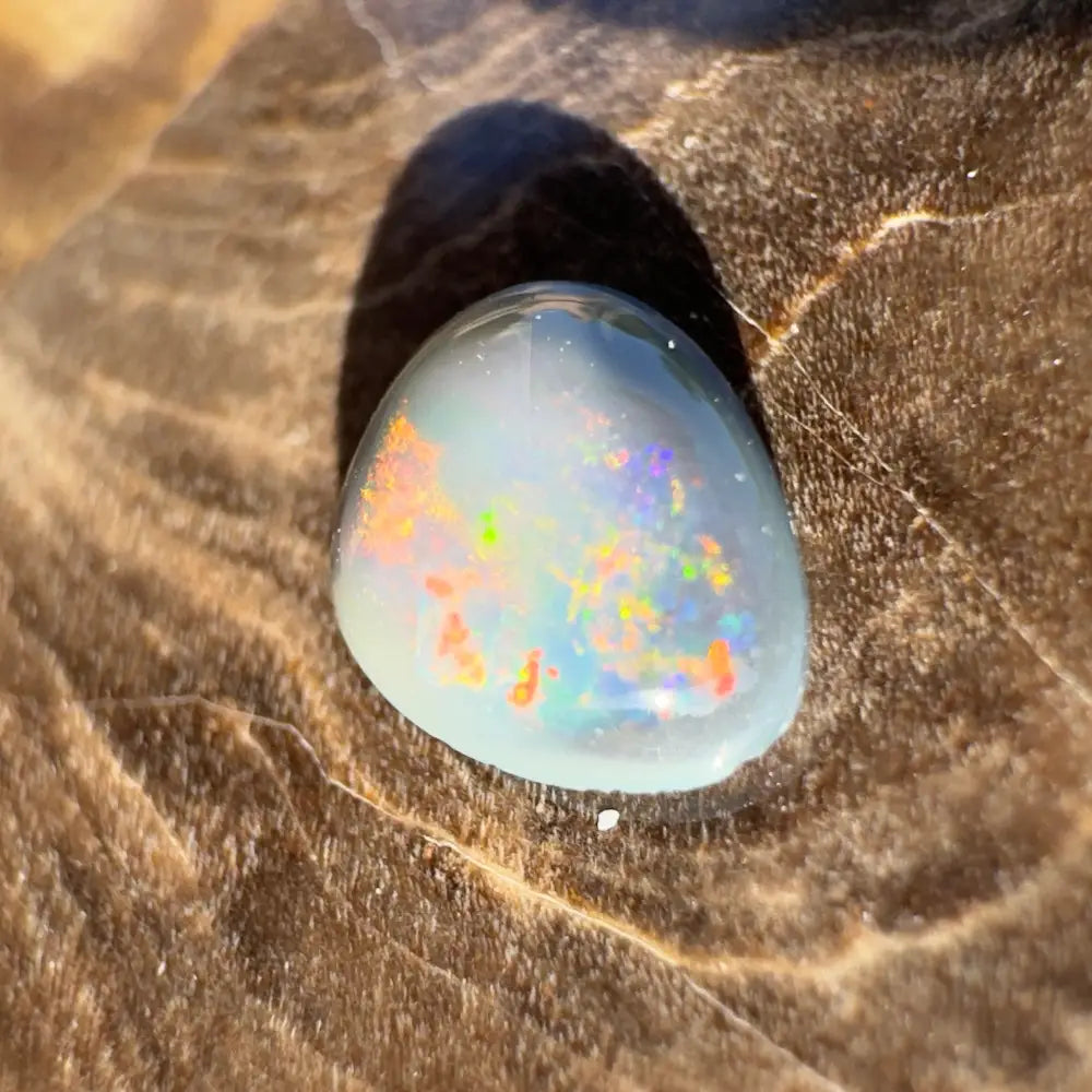 Iridescent opal cabochon from Lightning Ridge Semi Black Opal 0.4 carats solid hand-cut
