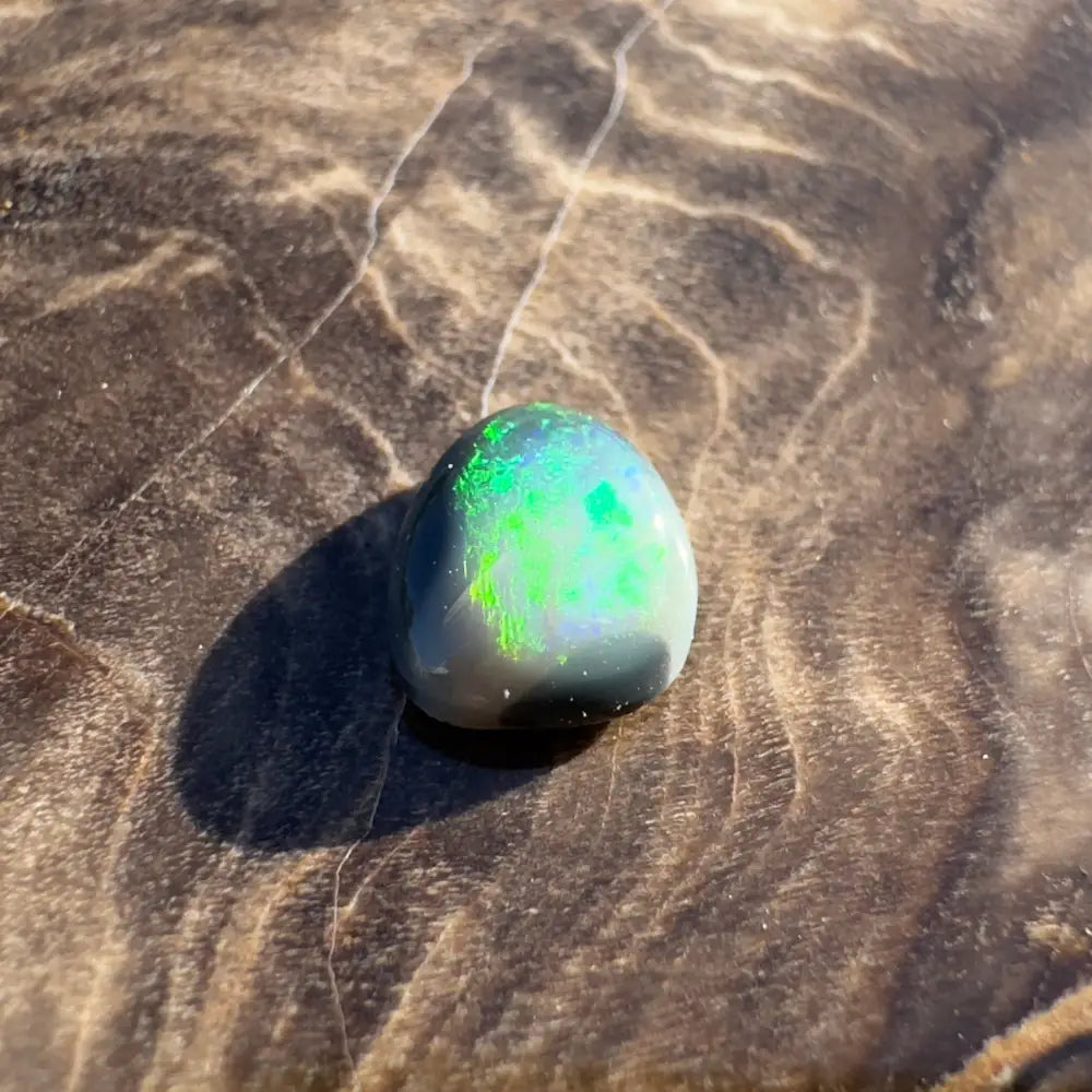 Iridescent green opal cabochon on Lightning Ridge Semi Black Opal 0.4carat solid hand-cut jewelry