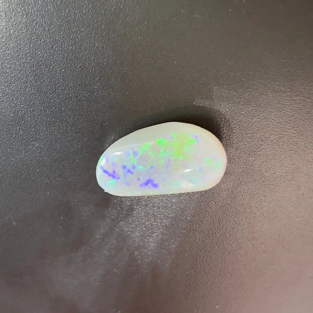 Iridescent opal cabochon from Lightning Ridge Semi Black Opal 1.2 carat solid hand-cut