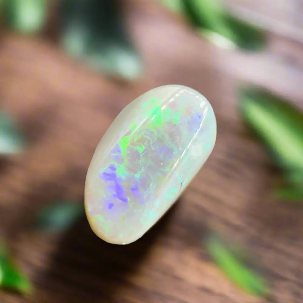 Iridescent Lightning Ridge Semi Black Opal gemstone 1.2 carats hand-cut product display