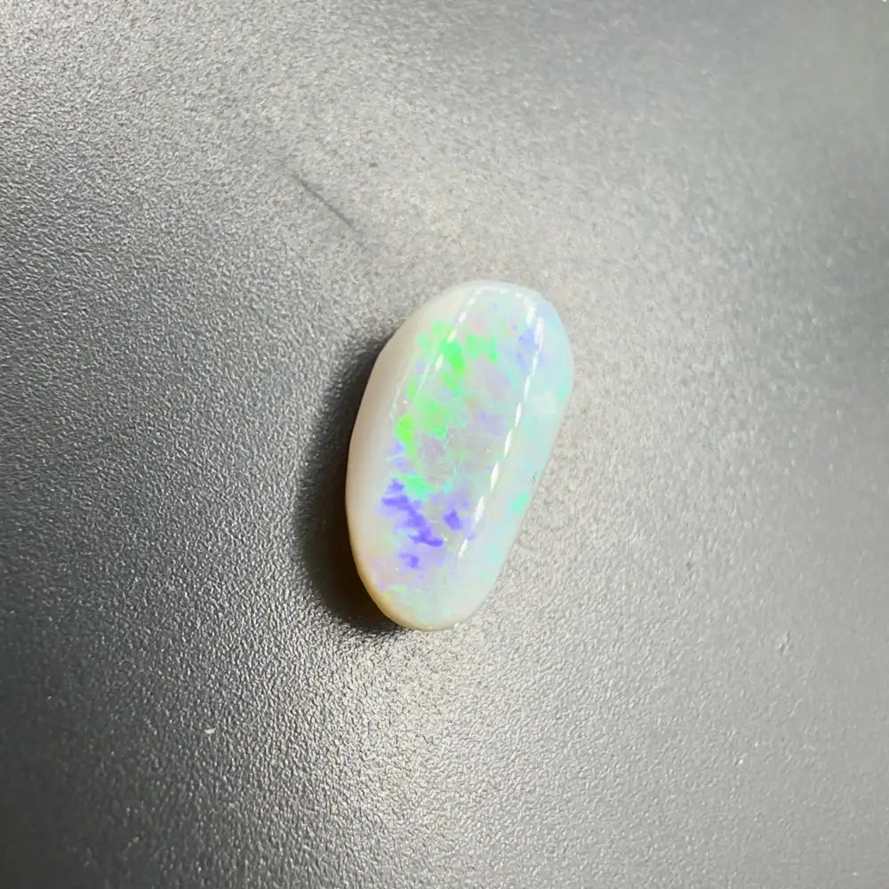 Iridescent white opal cabochon from Lightning Ridge Semi Black Opal 1.2carat