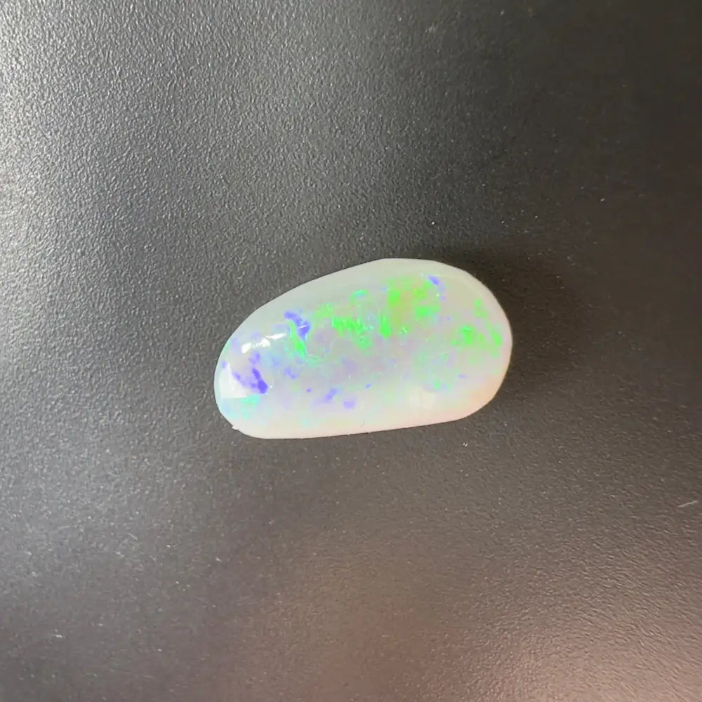 Iridescent opal cabochon from Lightning Ridge semi-black opal 1.2 carats solid hand-cut