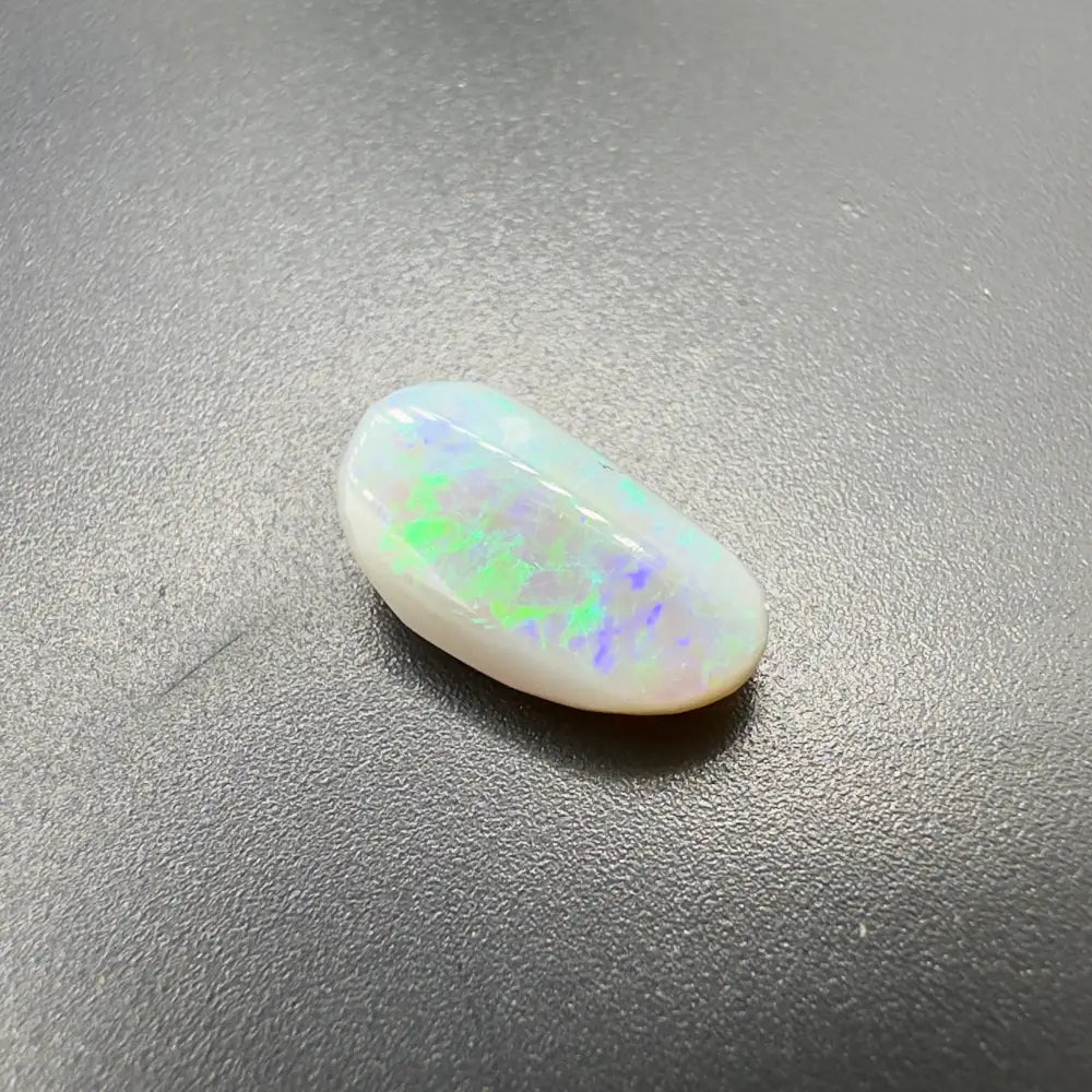 Iridescent white opal cabochon from Lightning Ridge Semi Black Opal 1.2 carat product