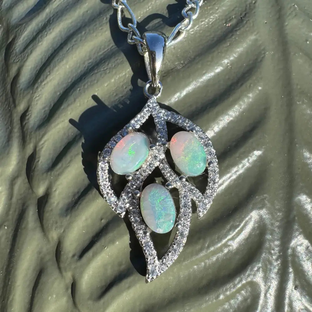 Leaf-shaped opal and diamond pendant from New Leaf handcrafted silver jewelry