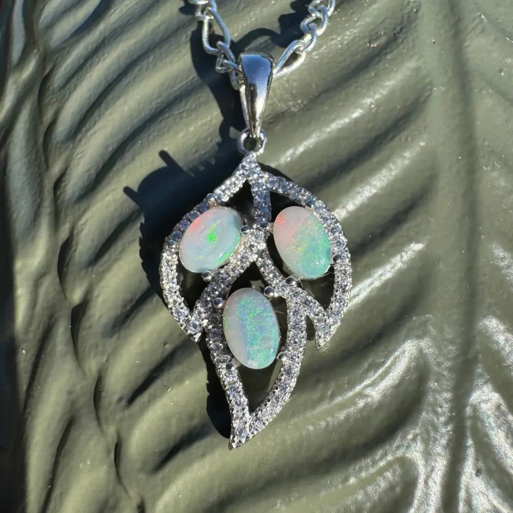 Leaf-shaped opal and diamond pendant necklace with 1.2ct Lightning Ridge Opal in silver