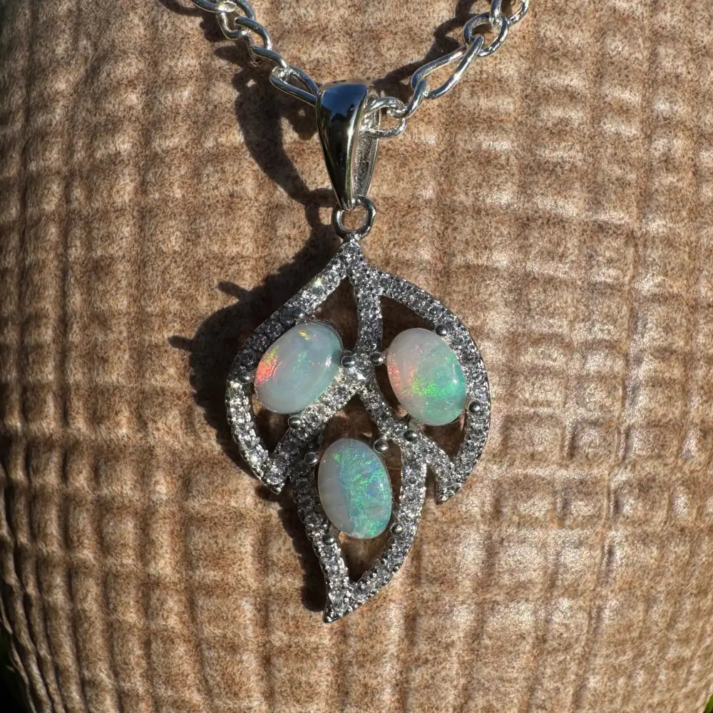 Silver leaf pendant with lightning ridge opals and cubic zirconia in sterling silver