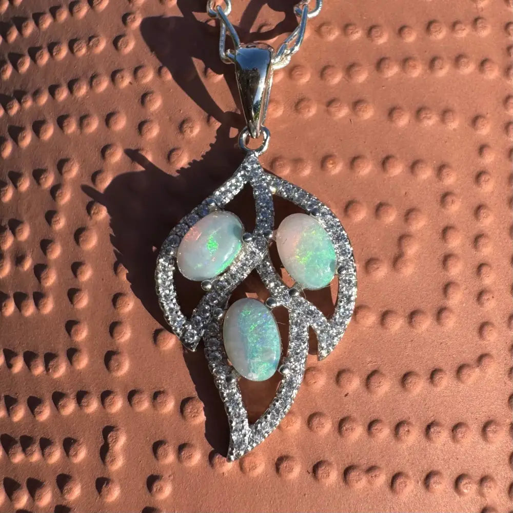 Leaf-shaped opal and diamond pendant with 1.2ct Lightning Ridge Opal in sterling silver