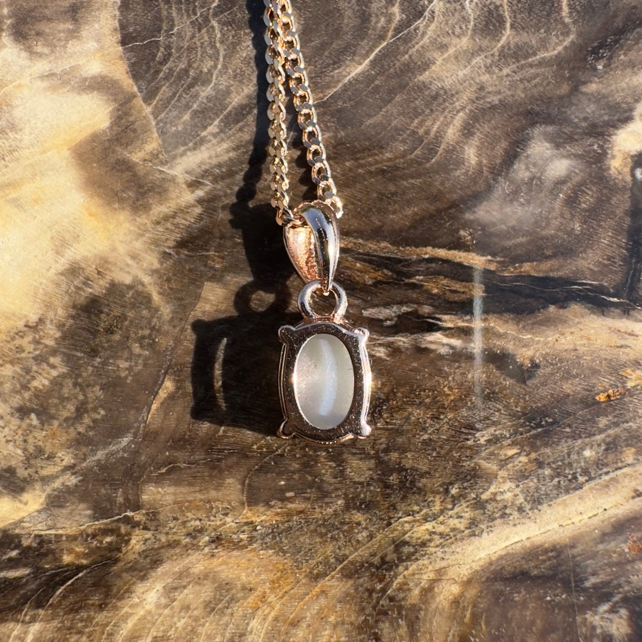 Nullarbor Grace - 0.6ct Coober Pedy Opal Rose Gold Coated 925 Silver Pendant