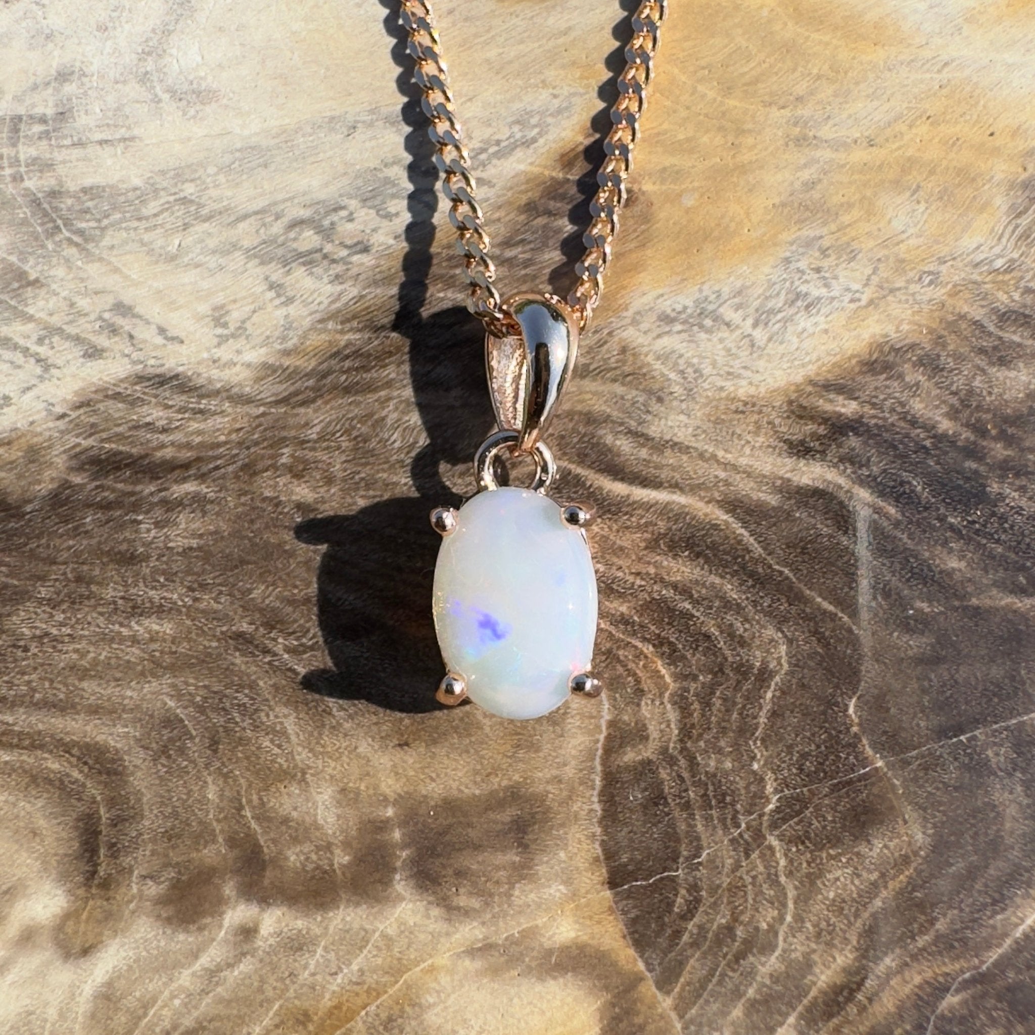 Nullarbor Grace - 0.6ct Coober Pedy Opal Rose Gold Coated 925 Silver Pendant