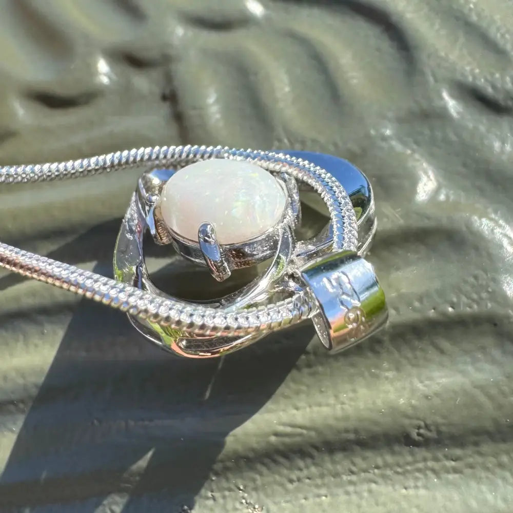 Silver pendant with white Coober Pedy opal gemstone in handcrafted sterling silver necklace