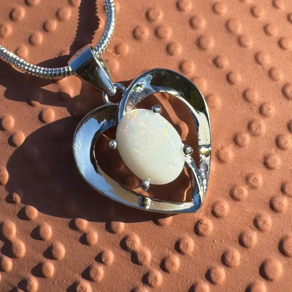 Silver heart pendant with a 0.9ct Coober Pedy opal from the Opal Love necklace collection