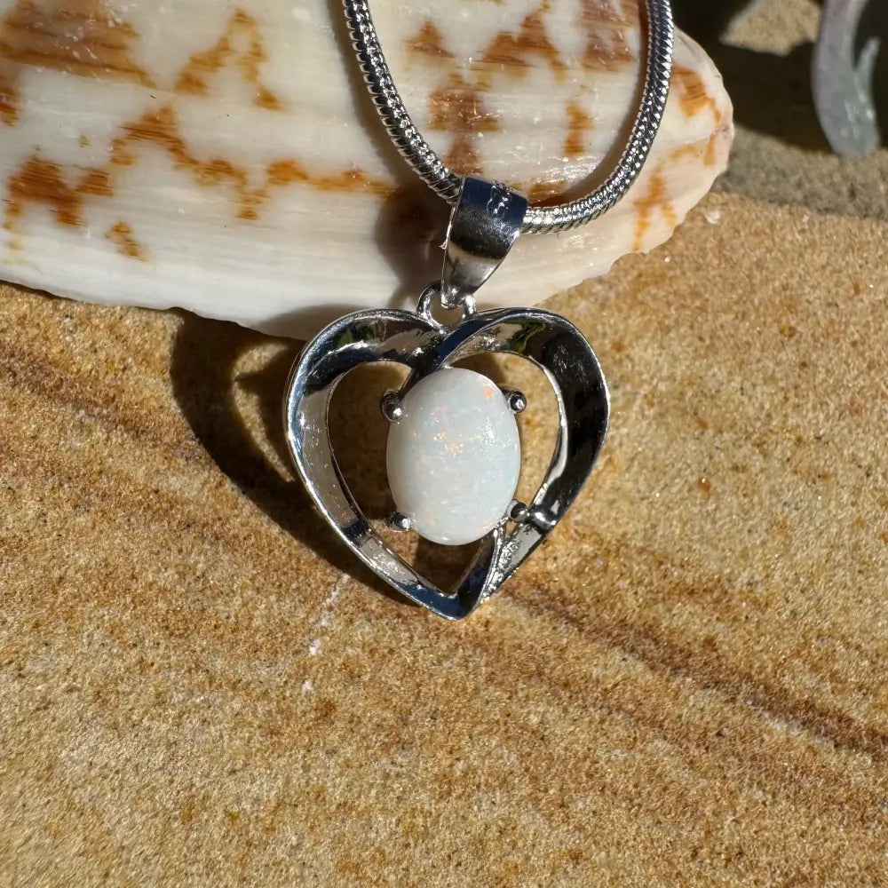 Silver heart pendant with white opal in the Opal Love handcrafted 0.9ct Coober Pedy Opal necklace