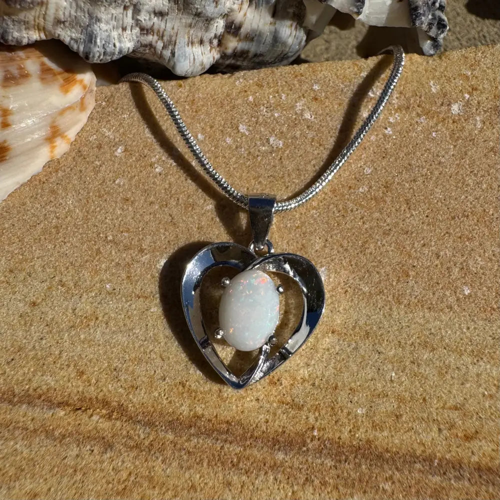 Silver heart pendant with a 0.9ct Coober Pedy opal from the Opal Love collection
