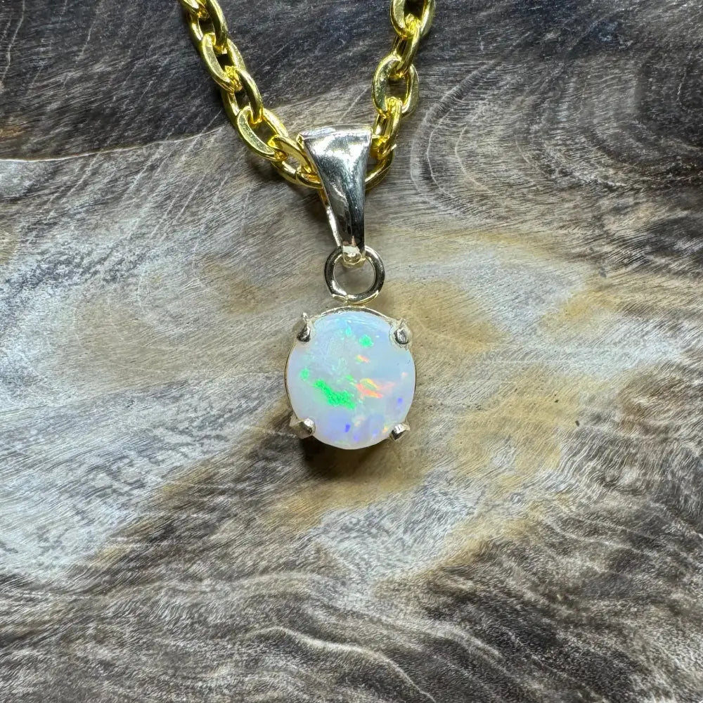 Gold chain necklace with a Coober Pedy opal pendant from Outback Dreams handcrafted in 9ct gold