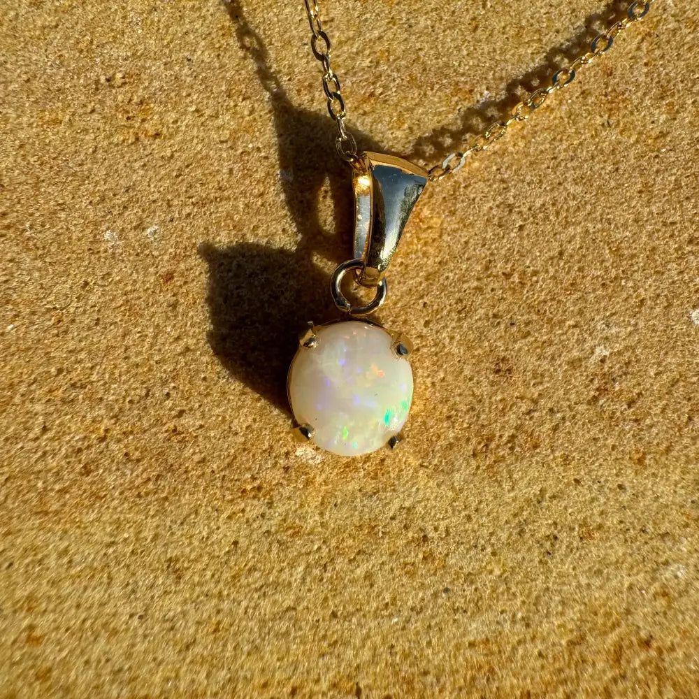 Opal pendant necklace in handcrafted 9ct solid gold with 0.8ct Coober Pedy opal