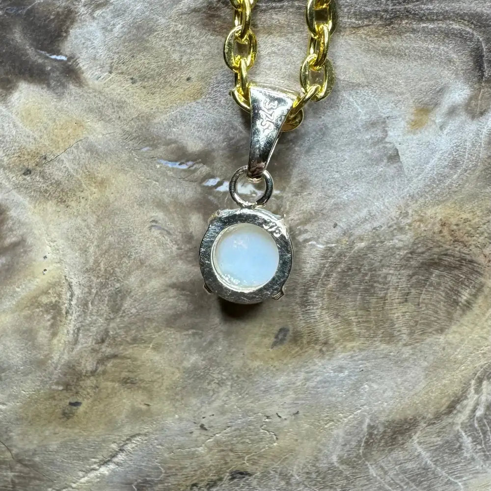 Gold chain with silver pendant featuring a white Coober Pedy Opal gemstone, Outback Dreams