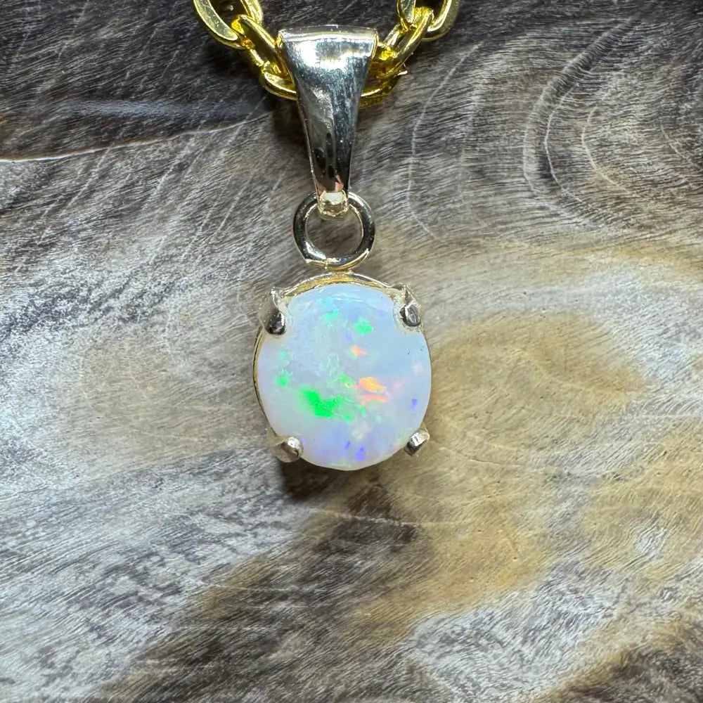 Opal pendant with gold chain from Outback Dreams Featuring Coober Pedy Opal