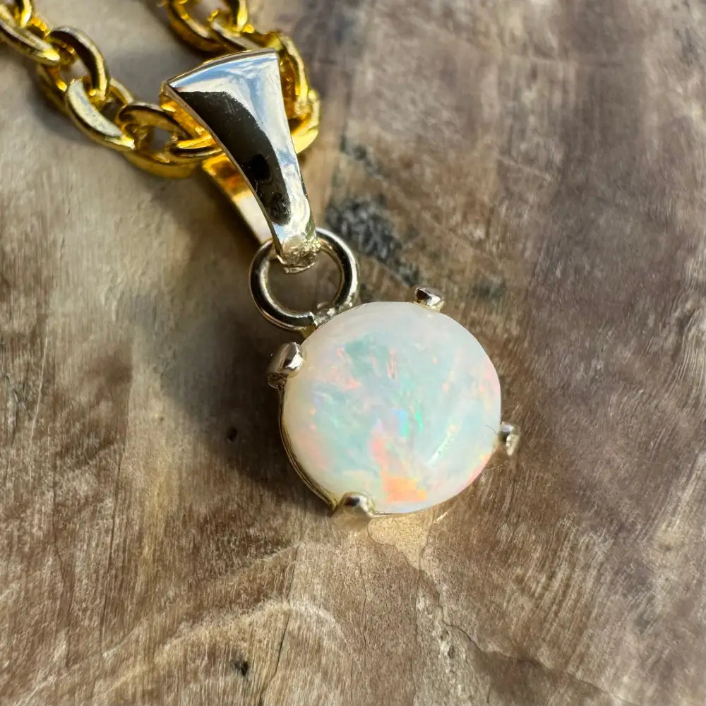 Handcrafted Outback Fire 9ct solid gold Opal pendant on a gold chain
