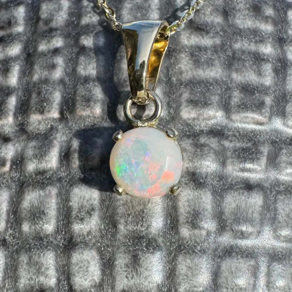 Outback Fire handcrafted 9ct solid gold opal pendant necklace featuring 0.8ct Coober Pedy Opal