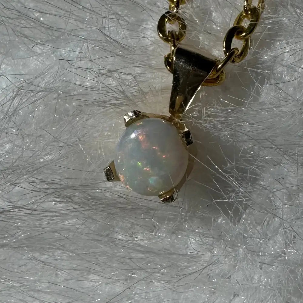 Gold chain with handcrafted 9ct solid gold Coober Pedy opal pendant in Outback Radiance collection