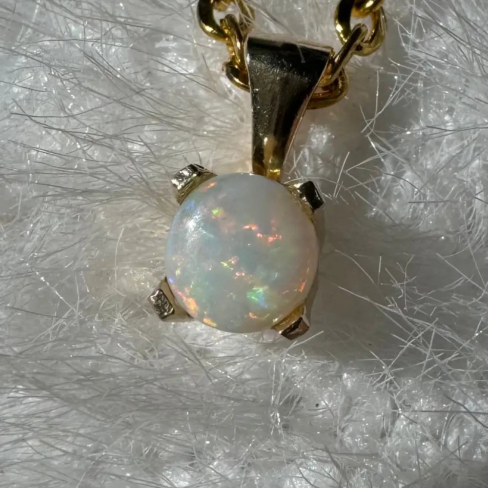 Gold chain necklace with a Coober Pedy Opal pendant from Outback Radiance collection