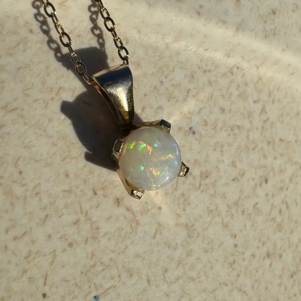 Elegant Opal pendant necklace in handcrafted 9ct solid gold from Outback Radiance collection