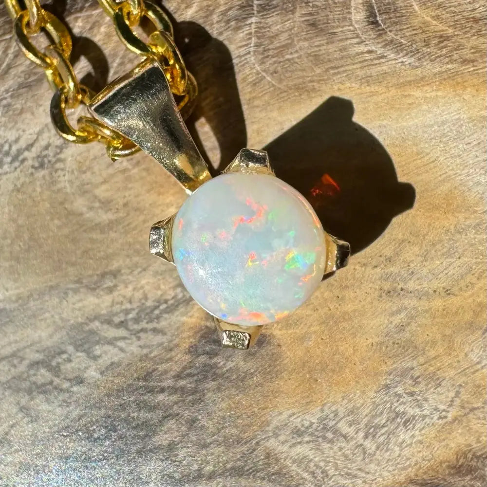 Gold chain with a Coober Pedy opal pendant from Outback Radiance handcrafted in 9ct solid gold