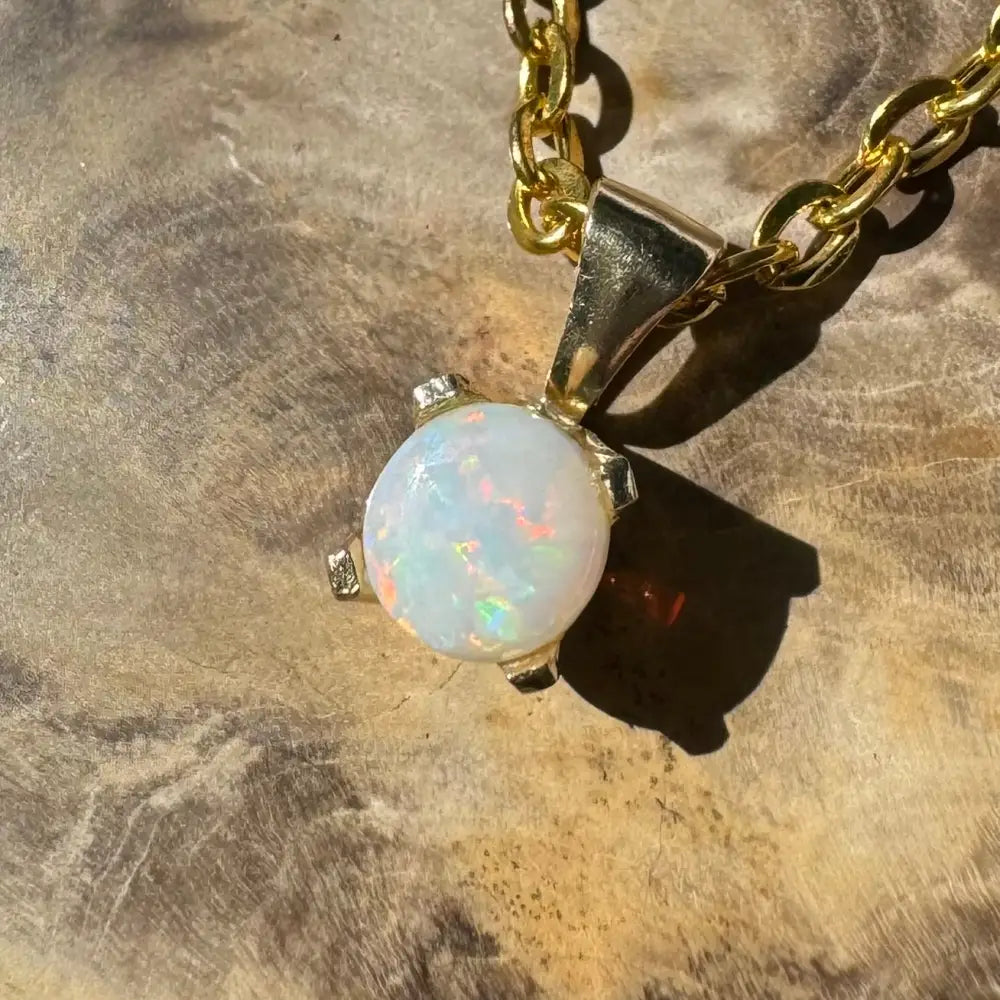Gold chain necklace with a Coober Pedy opal pendant from Outback Radiance collection