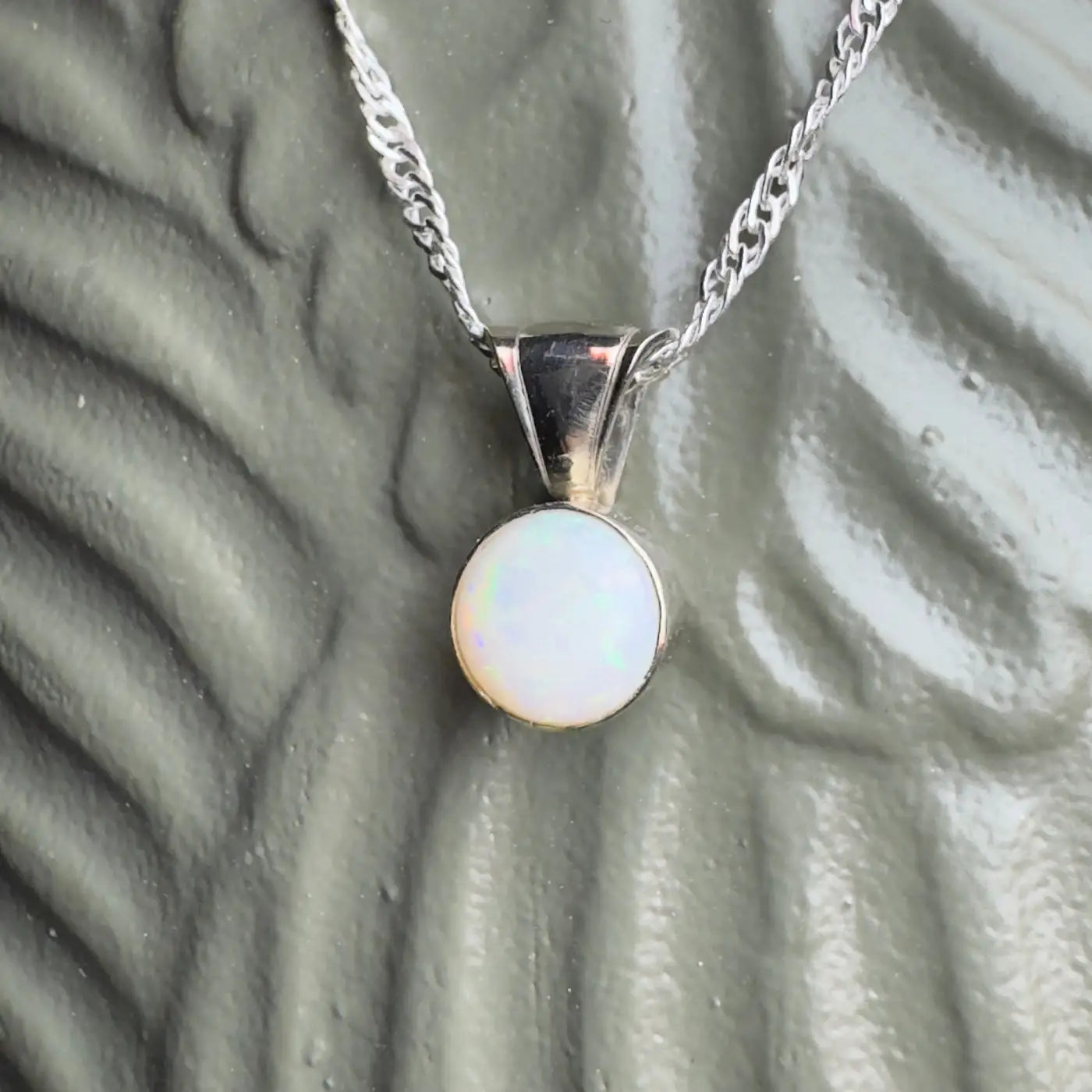 Silver chain necklace with a 1-carat Coober Pedy opal pendant from Outback to Ocean