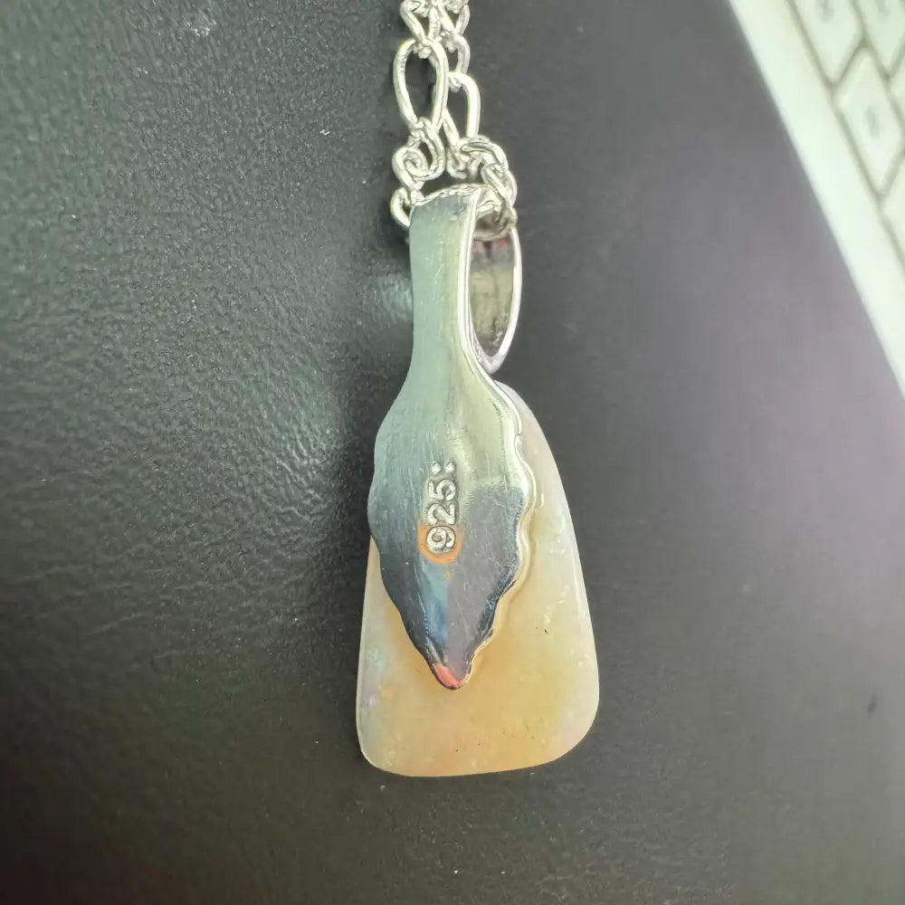 Silver pendant with a light-colored Lightning Ridge Opal in a handcrafted Sterling Silver necklace