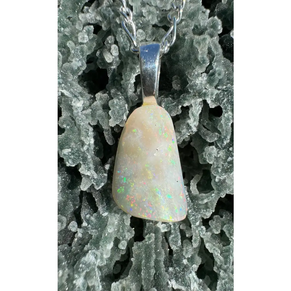 Rainbow Falls handcrafted Lightning Ridge Opal pendant with silver bail on necklace