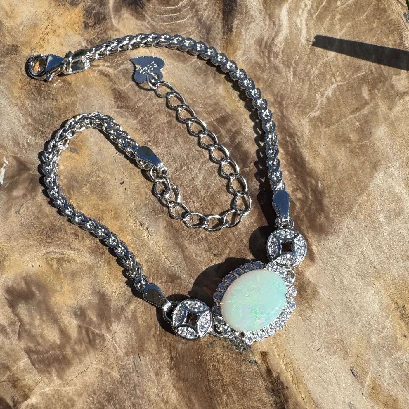 Silver opal bracelet from Rainforest Light featuring Coober Pedy opal and cubic zirconia