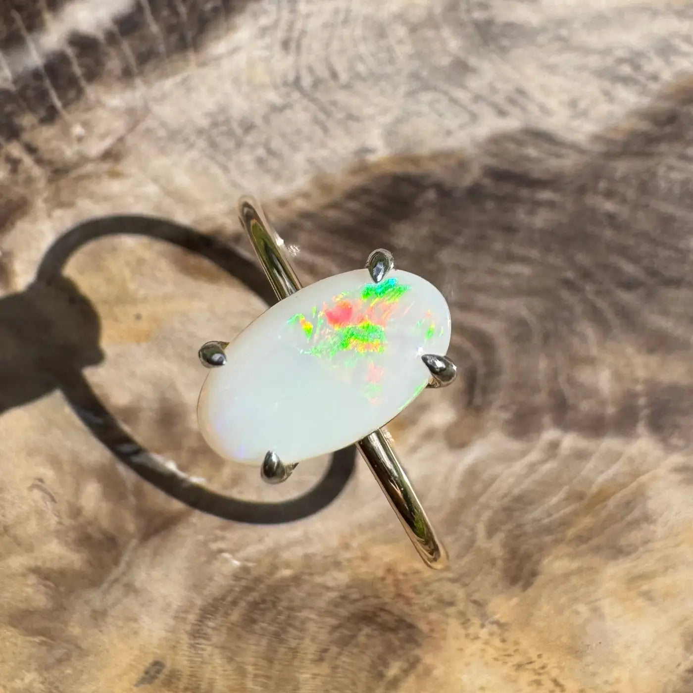 Oval opal ring with silver band from Rolling Colours of Coober handcrafted opal collection