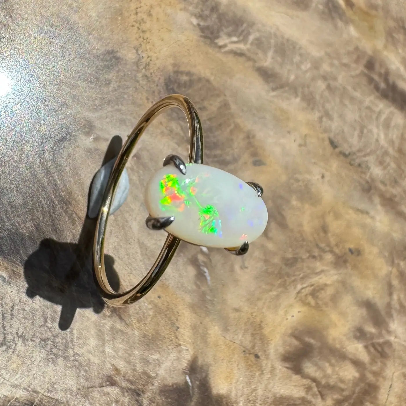 Opal ring with a gold band from Rolling Colours of Coober handcrafted 0.9ct Coober Pedy Opal
