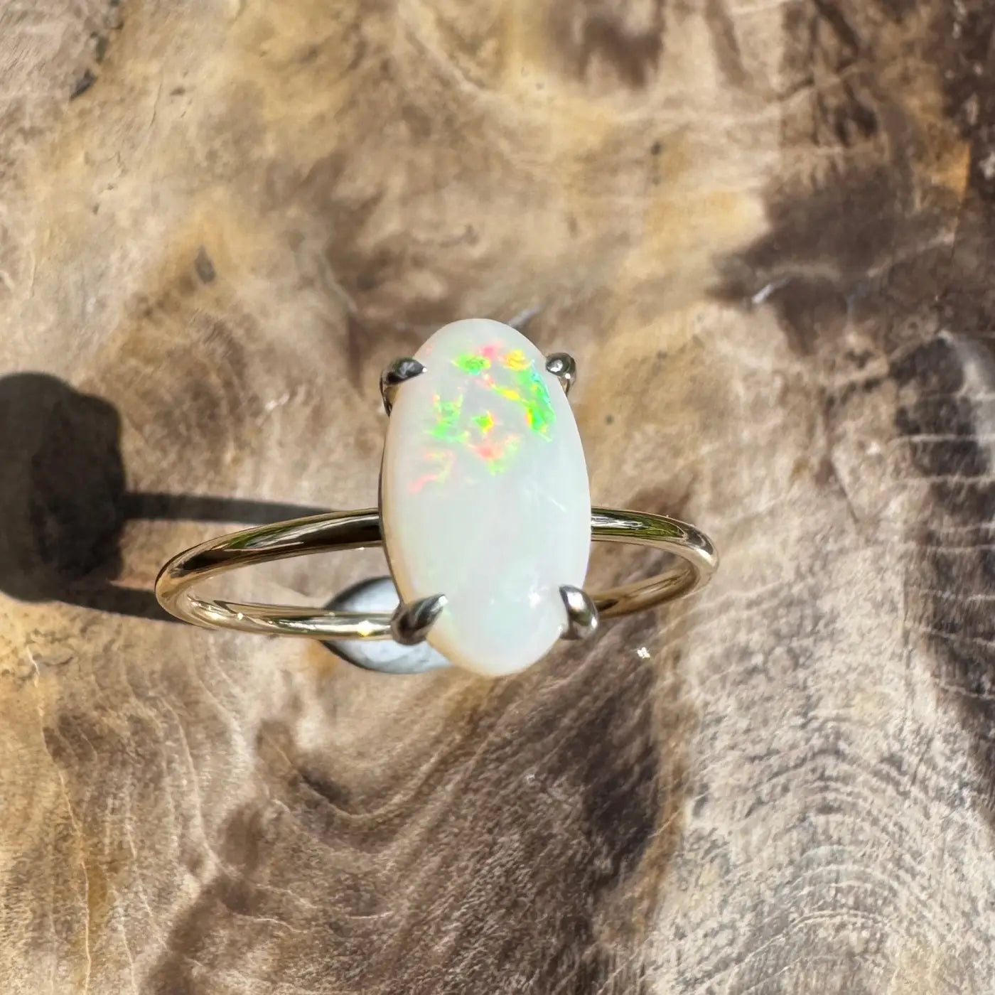 Opal gemstone ring from Rolling Colours of Coober handcrafted with 0.9ct solid Coober Pedy opal in 9ct yellow gold